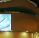 Projection of a video of the behinds of Roman sculptures projected on the side of the Guggenheim Museum