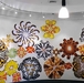 Wheat paste mural of design created from digital prints of moths photographed in the United States. Moth mandalas create total immersive design