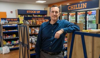 Xaq Frohlich standing inside a grocery store