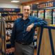Xaq Frohlich standing inside a grocery store