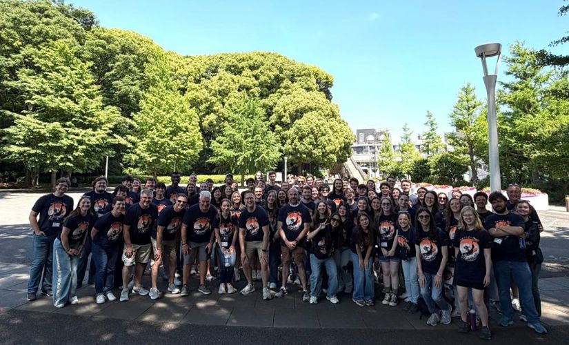Auburn band students posing for a picture in an outdoor setting