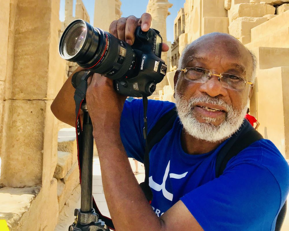 Chester Higgins holding a camera