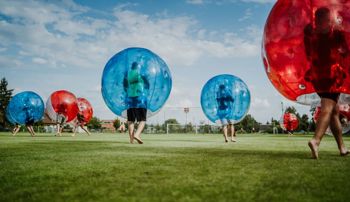People in bubbles playing 