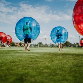 People in bubbles playing 