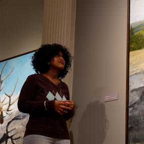 Precious Roberts-Miller guides a museum tour