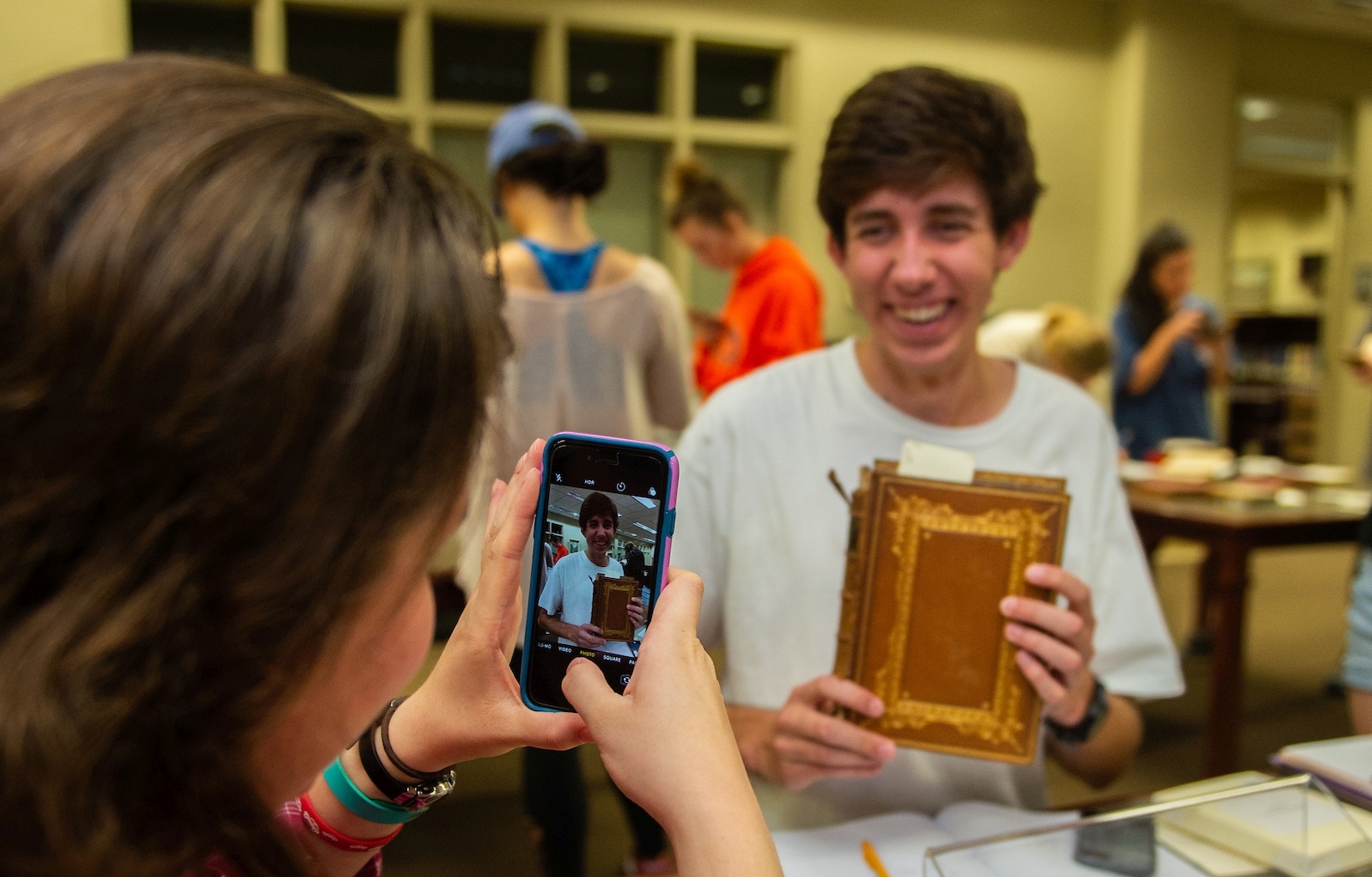 Student holding a book