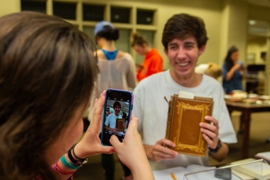 Student holding a book