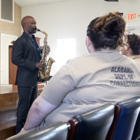 Khari Allen Lee plays the saxophone in the Tutwiler Prison chapel