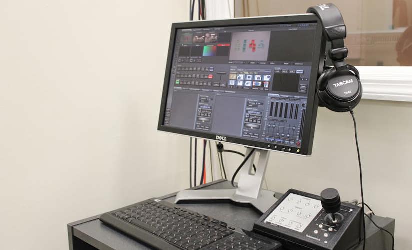A photo of computers in the LUCIA lab control room running the Tricaster Broadcasting software. 