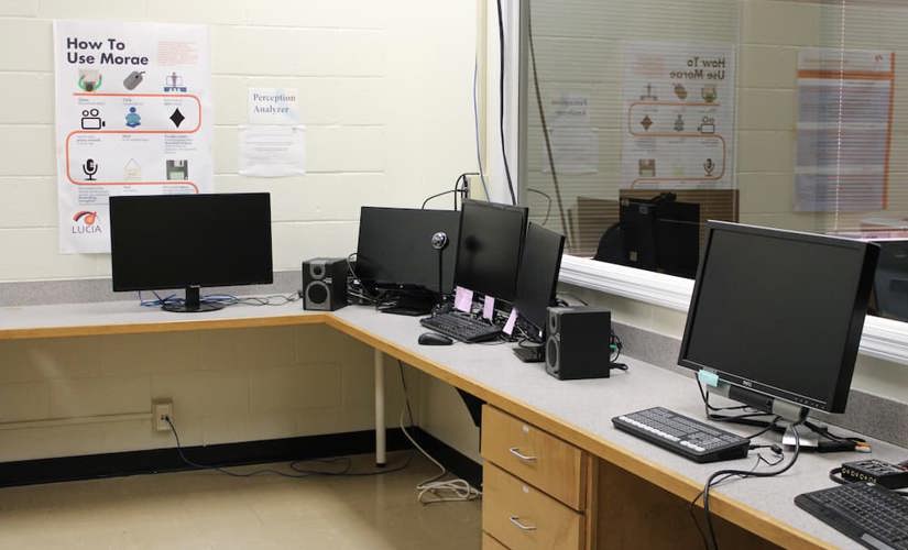 A photo of the LUCIA lab's control room, 1204, where the LUCIA team works during usability testing. 