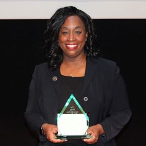 Melinda Walker holds the Philip Lutzenkirchen Excellence in Public Speaking Award