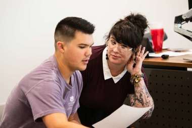 Student and teacher in a classroom 