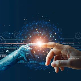 A human and robotic hand reaching out toward each other and creating a spark where they touch