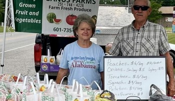 Ganus Farms presents produce at the market