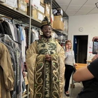 Student Wearing Gold Robe