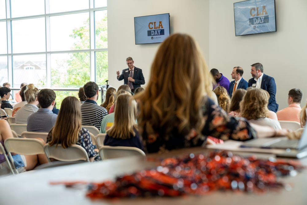 Dean Jason Hicks addresses guests at CLA Day