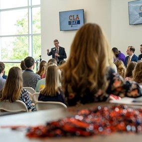 Dean Jason Hicks addresses guests at CLA Day