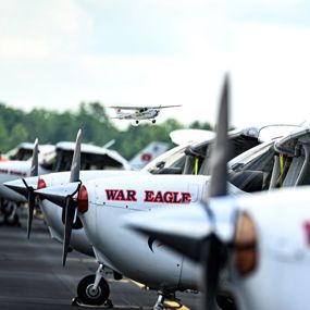 A row of Auburn University airplanes
