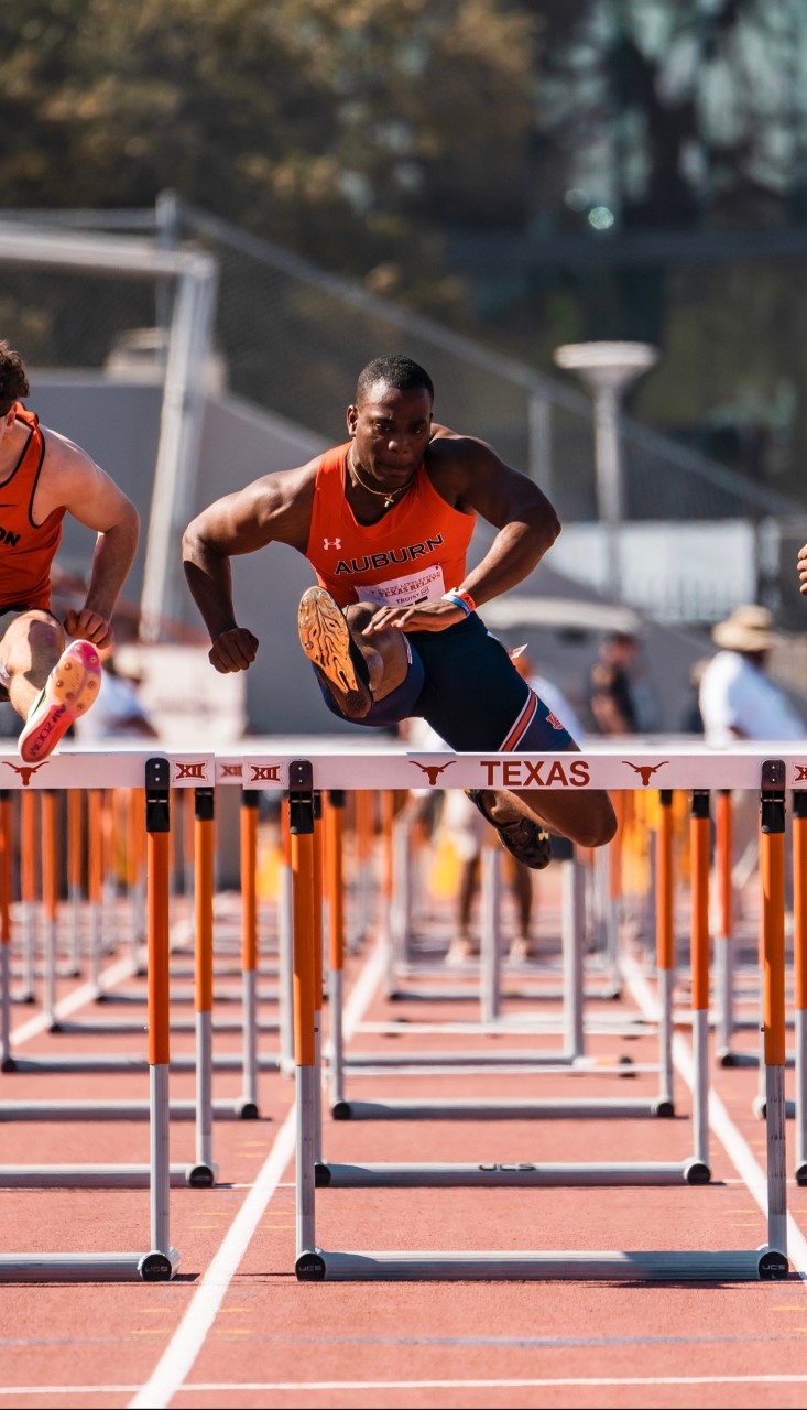 Oquendo Bernard competes in a hurdles track and field event at Auburn