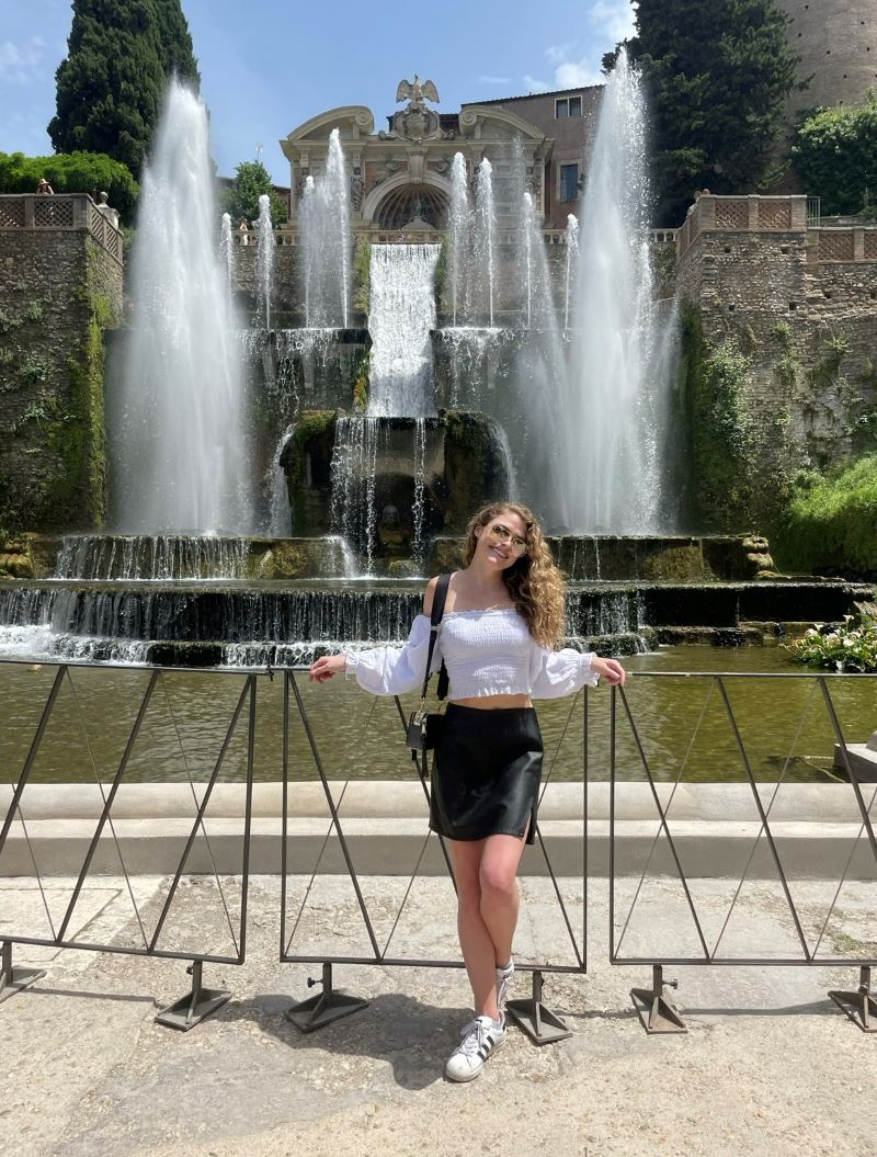 Sarah Walker in front of fountain