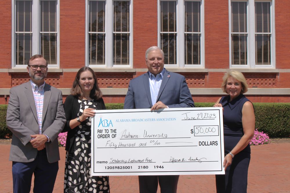 School of Communication and Journalism faculty receive 50,000 dollar check from the Alabama Broadcasters Association
