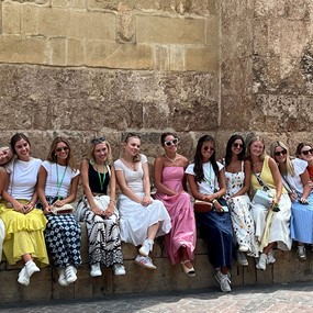 Public relations students posing for a group photo in Seville, Spain
