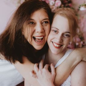 Amanda Piper laughing with her daughter Taylor