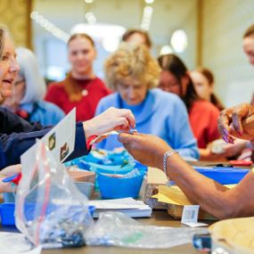 Quilters sharing materials at the Auburn Forum for Southern Art and Culture