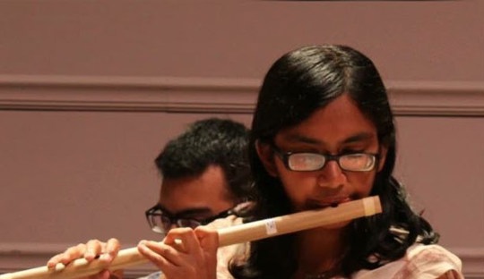 woman playing flute