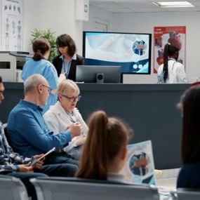 People waiting in a health care clinic's waiting room