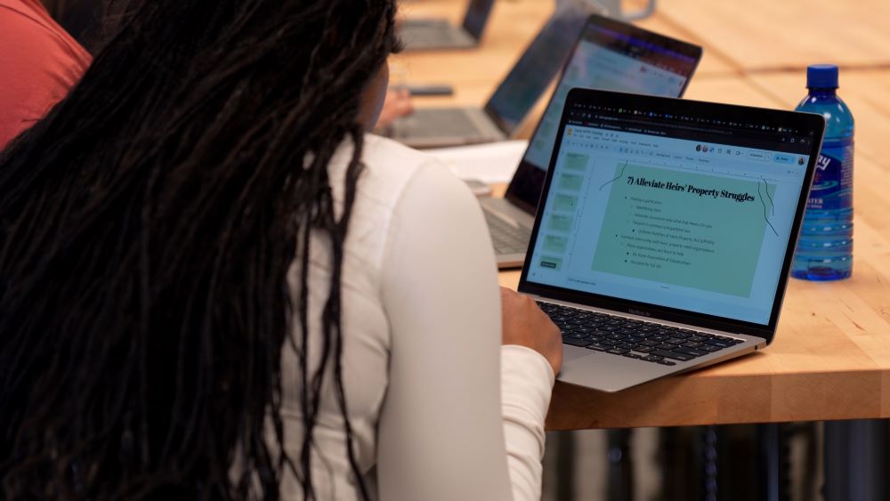 Student working on the heirs' property presentation