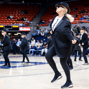 The Recycled TeenAgers performing at an Auburn women's basketball game