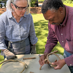Andrew McCall demonstrating basket weaving