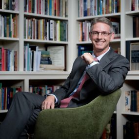 Dean Jason Hicks in the Center for Arts and Humanities library