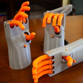 Three 3-D printed models of the Kassel Hand, a 16th-century prosthetic hand