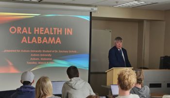Dr. Tommy Johnson presenting a lecture to students
