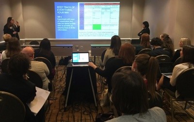 People looking at a presentation on a screen