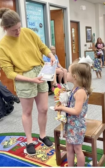 Haley Platt introduces “stuffies” at the WCPL’s Stuffed animal slumber party event.