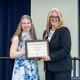Cambria Beane accepting the award for best graduate poster presentation