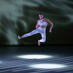 Morganne Svodoba leaping in the air