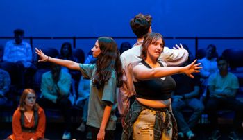Students performing original, devised work in "Body Maps" onstage