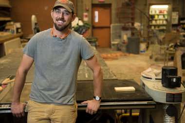Technical Director Matt Gist standing in the scene shop