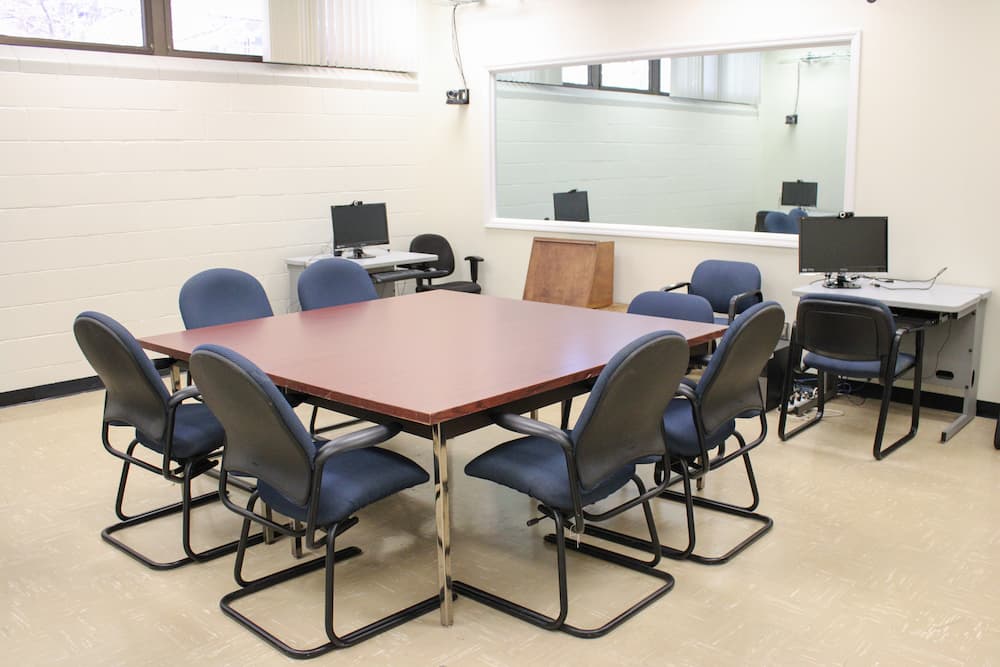 A photo of the LUCIA lab's experimental room, 1206, where focus groups and usability tests often take place. 
