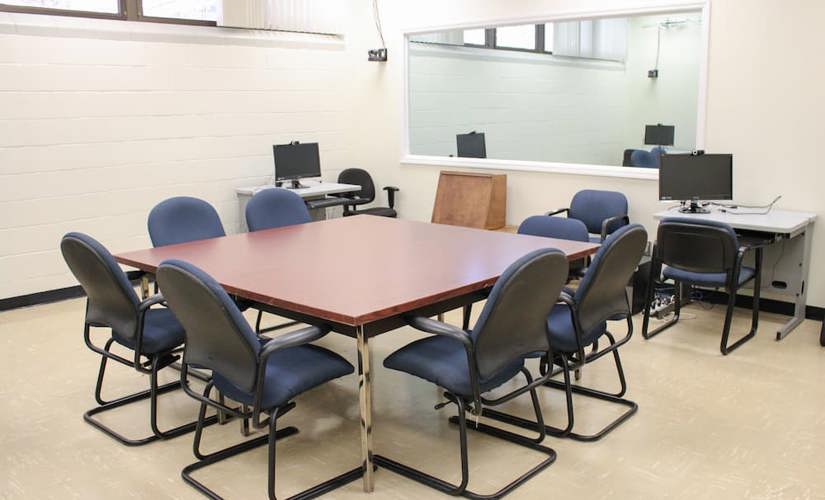 A photo of the LUCIA lab's experimental room, 1206, where focus groups and usability tests often take place. 