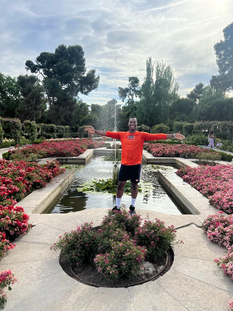 Oquendo Bernard stands in a garden in Spain