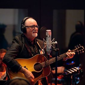 Don Clayton performing at Lucky Man Studio