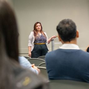 Sydney Waitz-Kudla presents at the annual research symposium