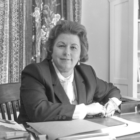 Leah Rawls Atkins circa 1985 sitting at director's desk in Pebble Hill