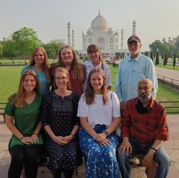 Students standing in front of Taj Mahal in India