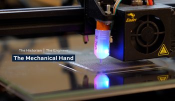 3D printer with text The Historian, The Engineer and the Mechanical Hand